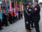 przypinanie medalu wyróżnionej druhnie OSP Dziekanowice