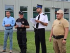 na fotografii ogłoszenie wyników od lweje radny Piotr Godula, pracownik Urzędu Andrzej Panuś, przewodniczący komisji sędziów Mateusz Jakubasz, prezes Zarządu Oddziału Miejsko-Gminnego ZOSP w Dobczycach Marcin AdamskiZOSP