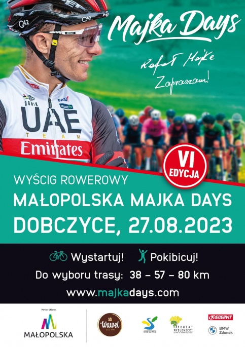 zielony plakat z rowerzystą na środku 